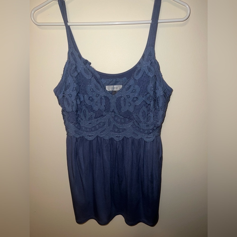 Cupid dressy tank size small but will fit medium And Large